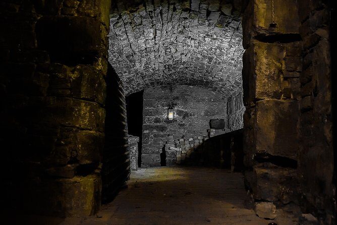 City of the Dead Underground Vaults (Day) - The story engine: ghost tales tied to real suffering