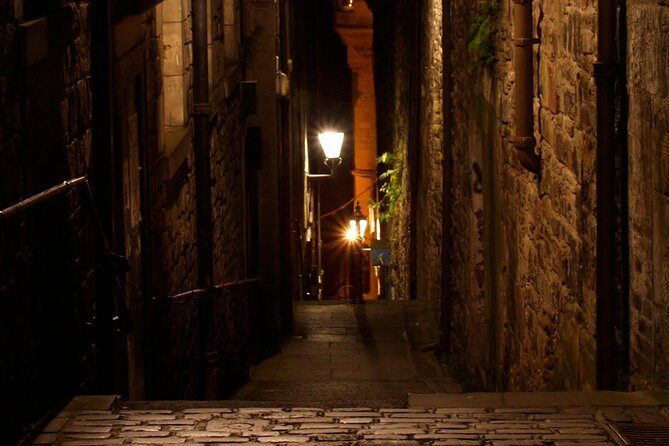 Edinburgh 2 Hour Nighttime Ghost Tour Italian Tour Guide - Old Calton Burial Ground and David Hume: A Cemetery Stop With Real Names