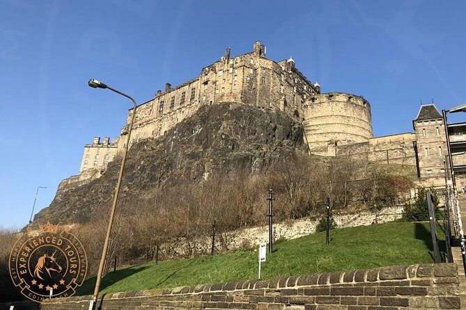 Edinburgh Half Day Guided Private Tour in a Premium Minivan - Holyrood Palace exterior areas and the Scottish Parliament contrast