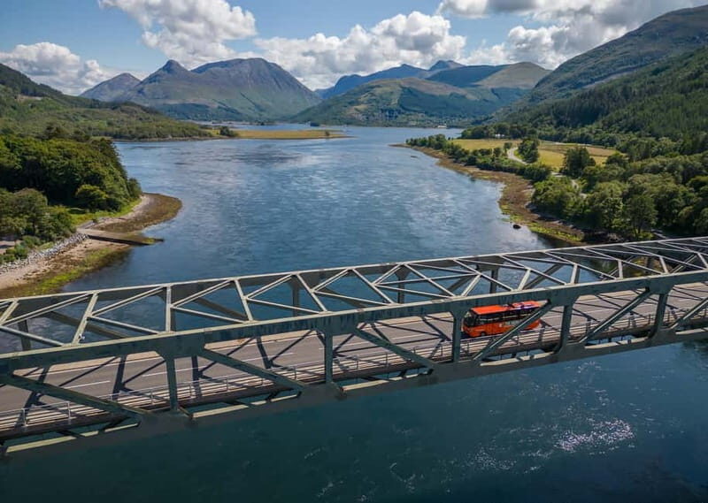 From Edinburgh: Glenfinnan Viaduct, Glencoe & Highlands Tour - Spean Bridge Commando Memorial and the Nevis Range view that hits