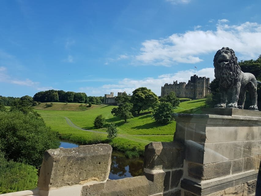From Edinburgh: Holy Island, Alnwick Castle & Northumbria - Holy Island (Lindisfarne): causeway views, Priory ruins, and Lindisfarne mead