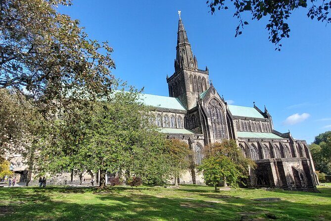 Privately Guided Day Tour of Glasgow in Luxury Minivan - West End drive-by: University of Glasgow and smart-looking streets