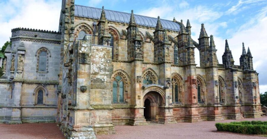 Rosslyn Chapel & Scottish Borders Tour from Edinburgh - Rosslyn Chapel carvings, stained glass, and the Holy Grail puzzle