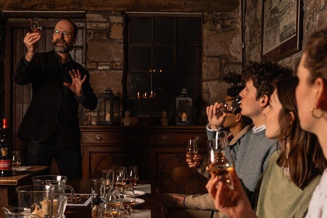 Small Group Edinburgh Whisky Tour and Tasting - The Old Town walk: Mercat Cross and the water of life story
